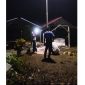 Pemasangan lampu jalan di area pemakaman umum.